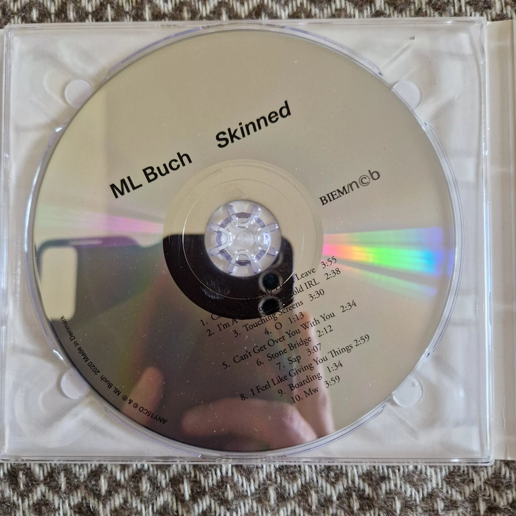 ML Buch - Skinned / CD Album