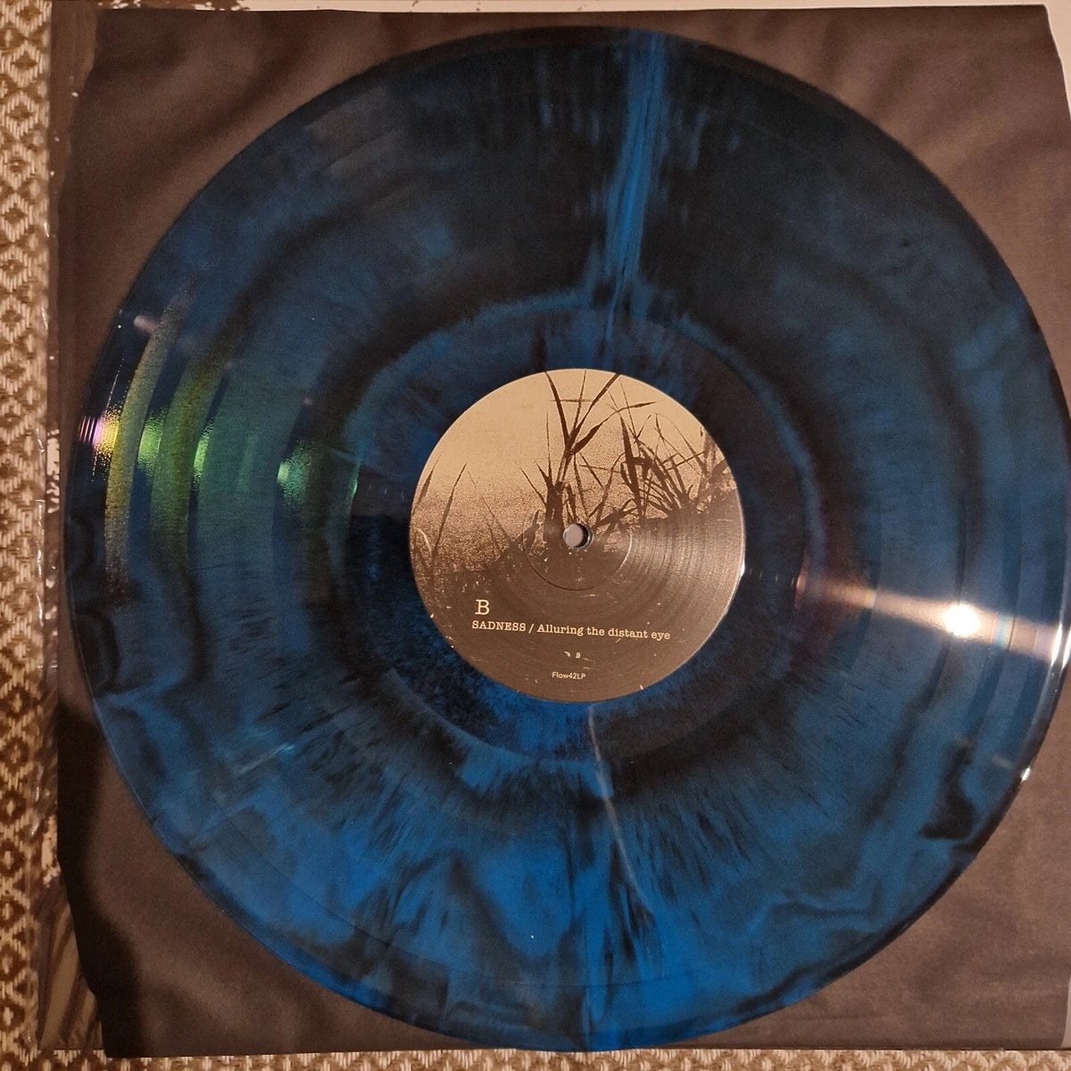 Sadness - Alluring The Distant Eye / Vinyl LP limited on Blue & Black Starbust
